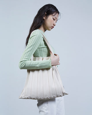 Knit Pleated Shoulder Bag made from Recycled Ocean Plastic - Cream