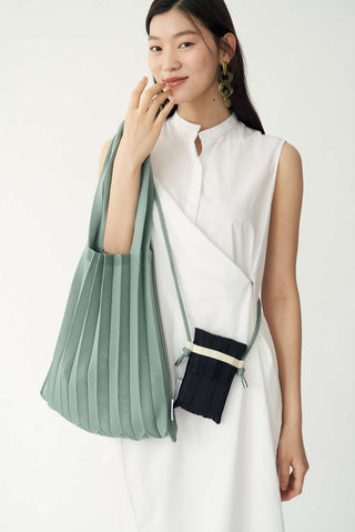 Knit Pleated Shoulder Bag made from Recycled Ocean Plastic - Teal Blue
